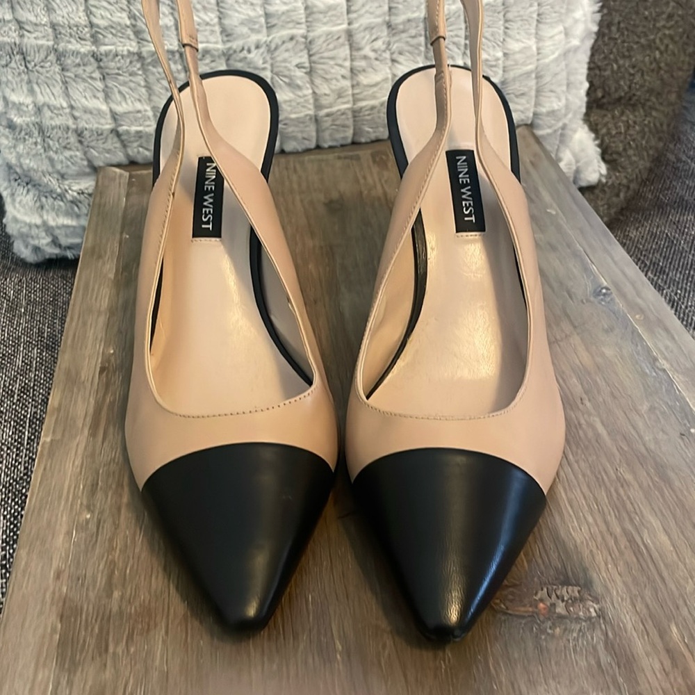 Nine West, size 8.5, tan with black toe, 3 inch high heel elegant sling back.
